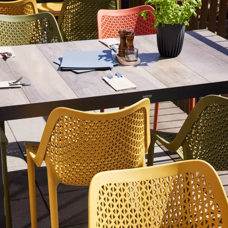 Siena Garden Urban Lights District Stapelsessel Polypropylen mustard Kostenloser Versand